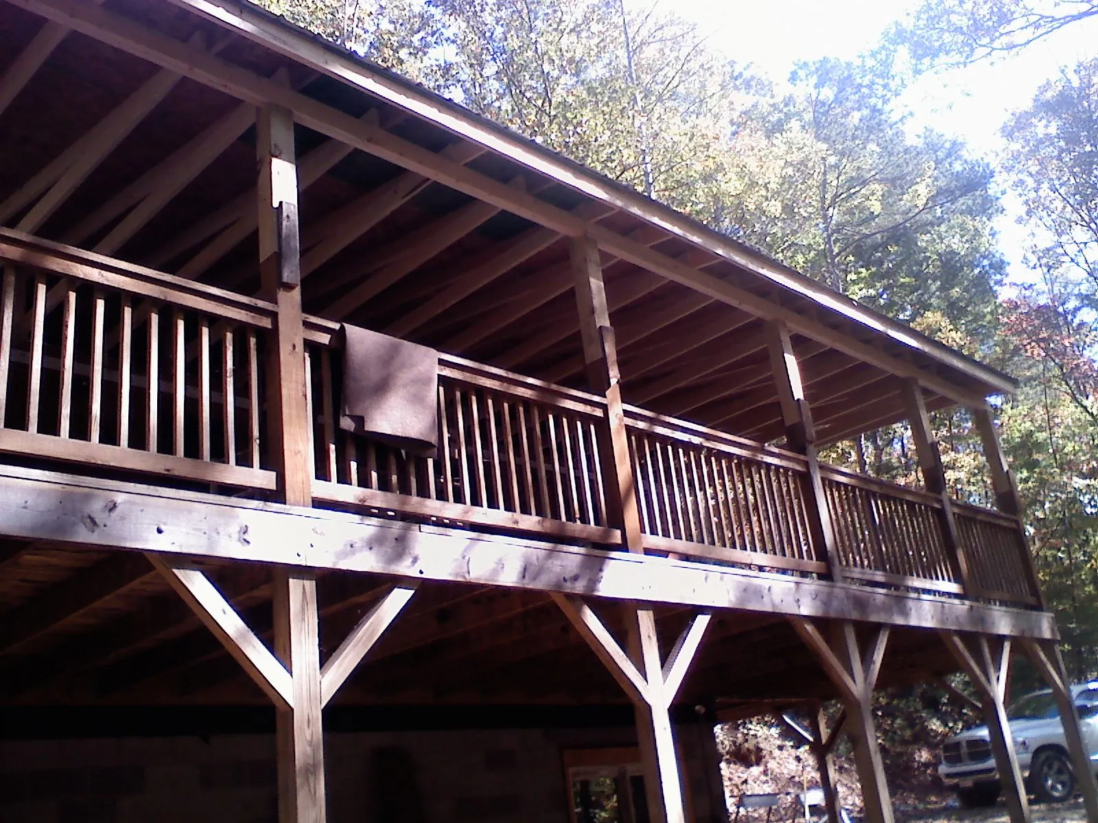 Timber framing under a new elevated porch and deck — Roof Leak Repair in Blandford by Roofing Brothers